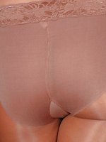 Tramp in pantyhose reveals all