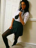Fabulous Felix in cute college uniform with sexy black pantyhose.