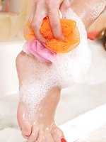 Soapy toes in the tub with Allison