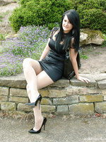 Black hair black stilettos and sexy black nylons