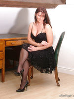 Jackie in little black dress and black stockings