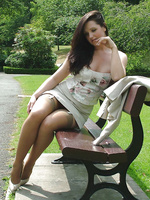 A walk in the park in fully fashioned stockings and cream stilettos