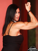 Elisa Ann Costa shows off her big strong hot powerful muscles as she strips.