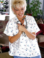 Mature blonde nurse slide out of her uniform and smiles
