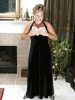 Mature and elegant Ariel strips off her black evening gown