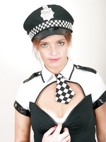 Sexy 34 year old Marie strips out of her cops uniform and spreads