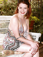 31 year old and redheaded Lilla Katt fooling around in the backyard