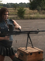 Armed girl Erica Campbell fires her guns