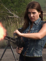 Armed girl Erica Campbell fires her guns