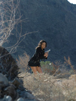 Ebony babe Amber Fox in an action photo shoot