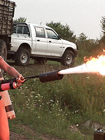 Skinny babe Susana Spears shoots a flame gun