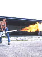 Veronica Zemanova shoots her huge fire gun outdoors