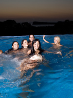 Eight babes in heat dive in the swimming pool