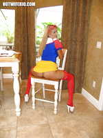 Rio trying on a snow white costume with sexy red stockings