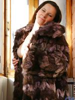 Hottie helen has nice tits hanging out of her furcoat as she stands in the sunlight