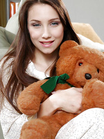 Sweet teen nubile celeste hangs out naked with her teddy bear caressing her boobs