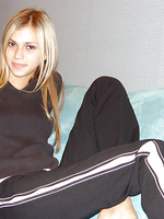 Seriously cute teen lounges in her jogging pants just looking fine as hell