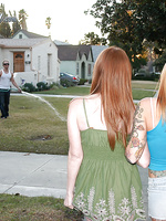 Two tattooed red headed sisters take a big cock and swap a load back and forth.