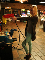 Putting a long churro in her mouth and handling an arcade gun makes Chloe yearn for Ryan's hard cock.