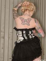 Gorgeous Tattooed Pinup Girl Strips