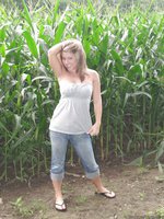 Blueyed Cass gets naked in a cornfield.
