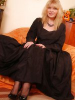 Angel in black sheer stockings and evenig dress