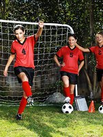 Three sexy girls warm up on the soccer field before taking advantage of the coaches hard dick.