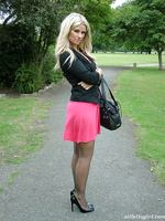 This cheeky blonde babe loves hanging out in public and showing off her heels