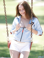 Cute teen tabitha has some fun on the swings flashing and peeking out her small cute boobies too