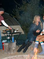 Kelly and Ryan go camping out in the wild and bring Isis along for some hot fucking threesome action in a tent.