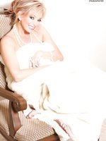 Rachel Aziani is stunning wearing nothing but pearls and a blanket!